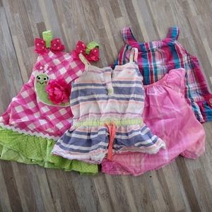 Lot of 4- short sleeve tops and dress's